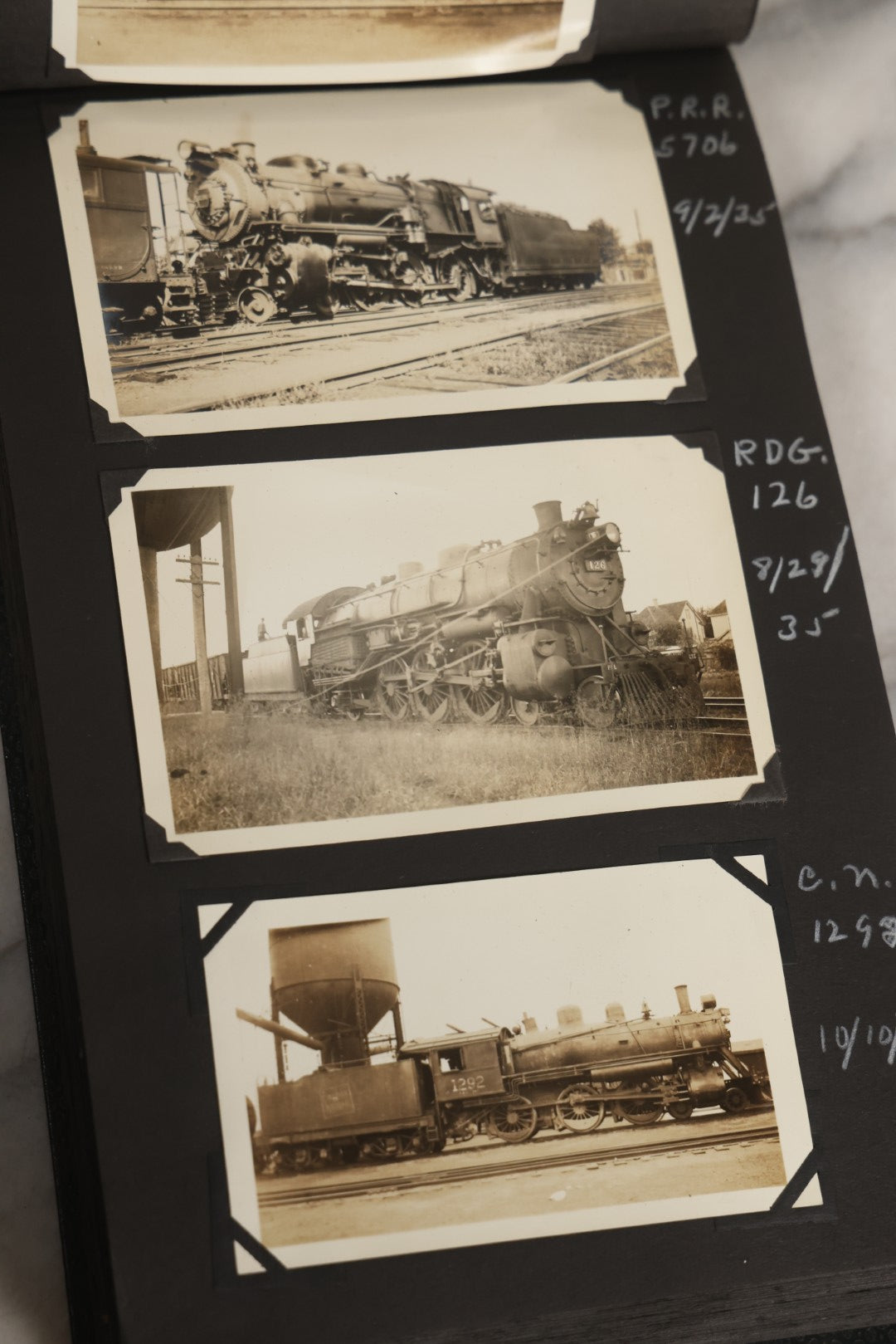 Lot 024 - Extensive Vintage 1934–1936 Snapshot Photograph Album Documenting Locomotives And Trains In The Eastern United States, 200+ Images With Detailed Handwritten Annotations