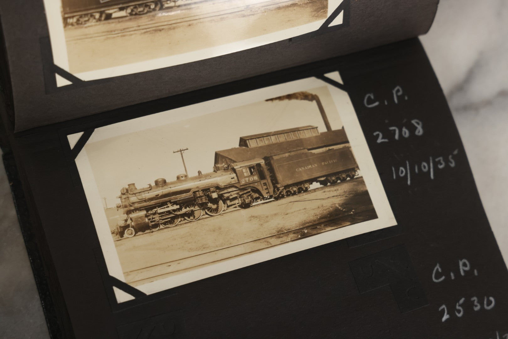 Lot 024 - Extensive Vintage 1934–1936 Snapshot Photograph Album Documenting Locomotives And Trains In The Eastern United States, 200+ Images With Detailed Handwritten Annotations