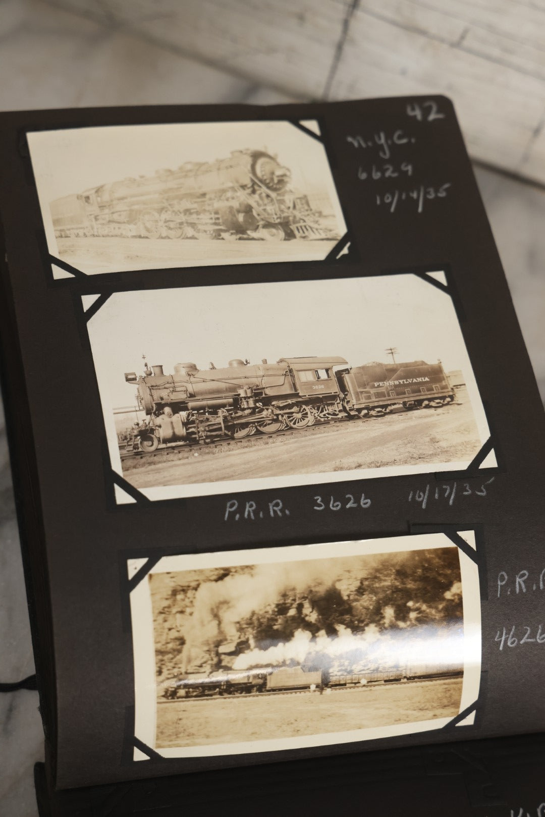 Lot 024 - Extensive Vintage 1934–1936 Snapshot Photograph Album Documenting Locomotives And Trains In The Eastern United States, 200+ Images With Detailed Handwritten Annotations