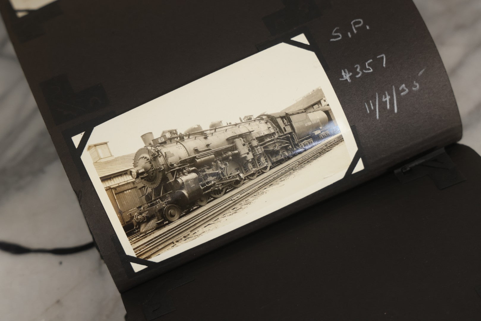 Lot 024 - Extensive Vintage 1934–1936 Snapshot Photograph Album Documenting Locomotives And Trains In The Eastern United States, 200+ Images With Detailed Handwritten Annotations