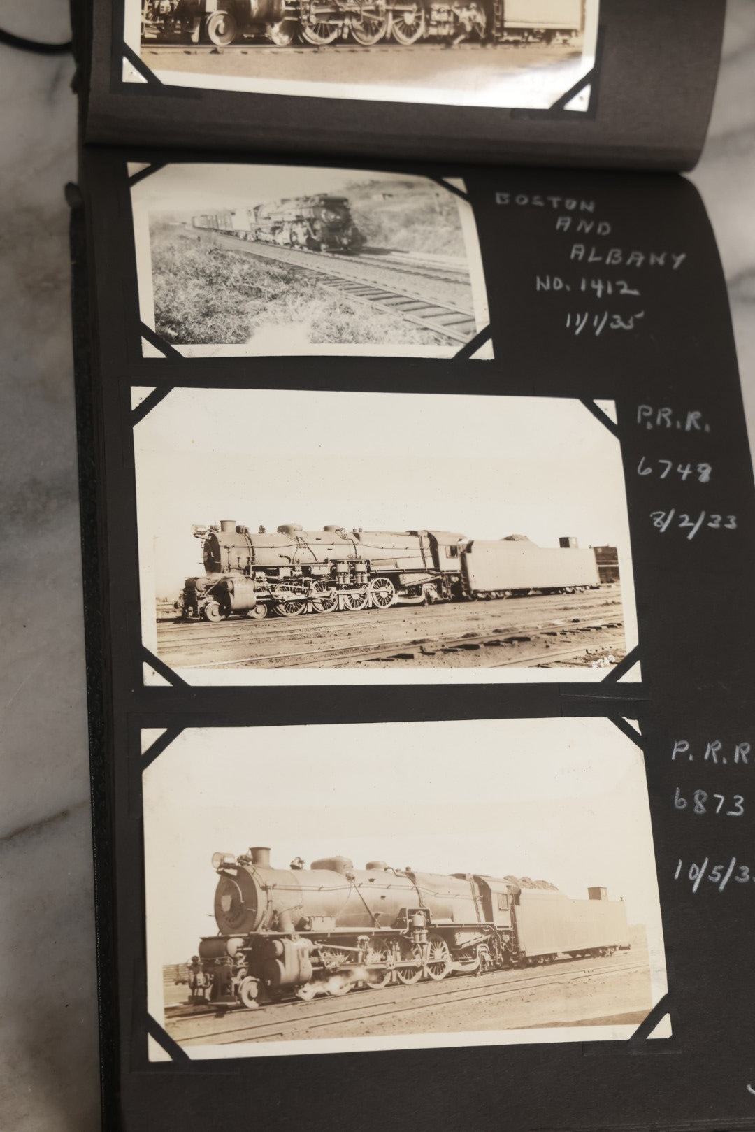 Lot 024 - Extensive Vintage 1934–1936 Snapshot Photograph Album Documenting Locomotives And Trains In The Eastern United States, 200+ Images With Detailed Handwritten Annotations