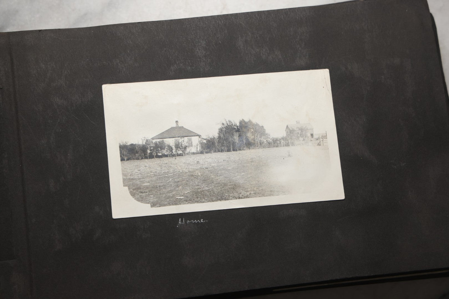 Lot 025 - Antique Snapshot Photo Album Gifted To Zella On Christmas 1916 With 1750+ Photos Of Midwest And Western Scenes Including Telluride & Greeley Colorado, Farm Life, Animals, Automobiles, Oil Wells, Early Aviation, And WWI Soldiers, 1916–1920