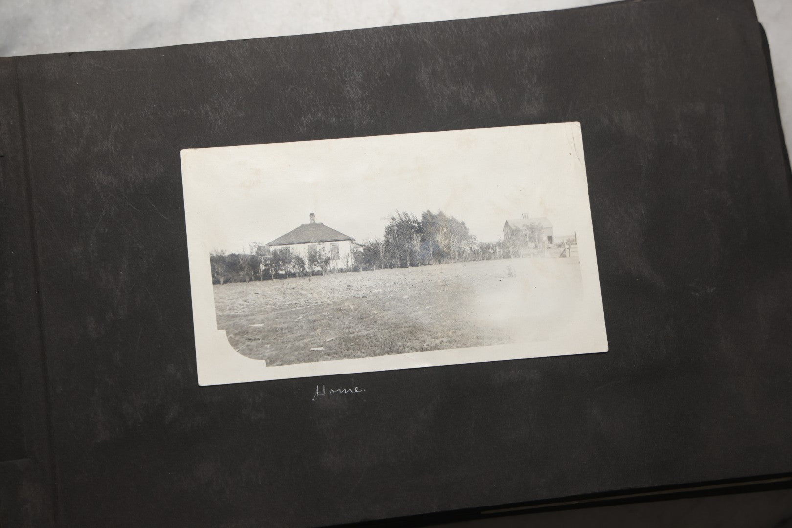 Lot 025 - Antique Snapshot Photo Album Gifted To Zella On Christmas 1916 With 1750+ Photos Of Midwest And Western Scenes Including Telluride & Greeley Colorado, Farm Life, Animals, Automobiles, Oil Wells, Early Aviation, And WWI Soldiers, 1916–1920