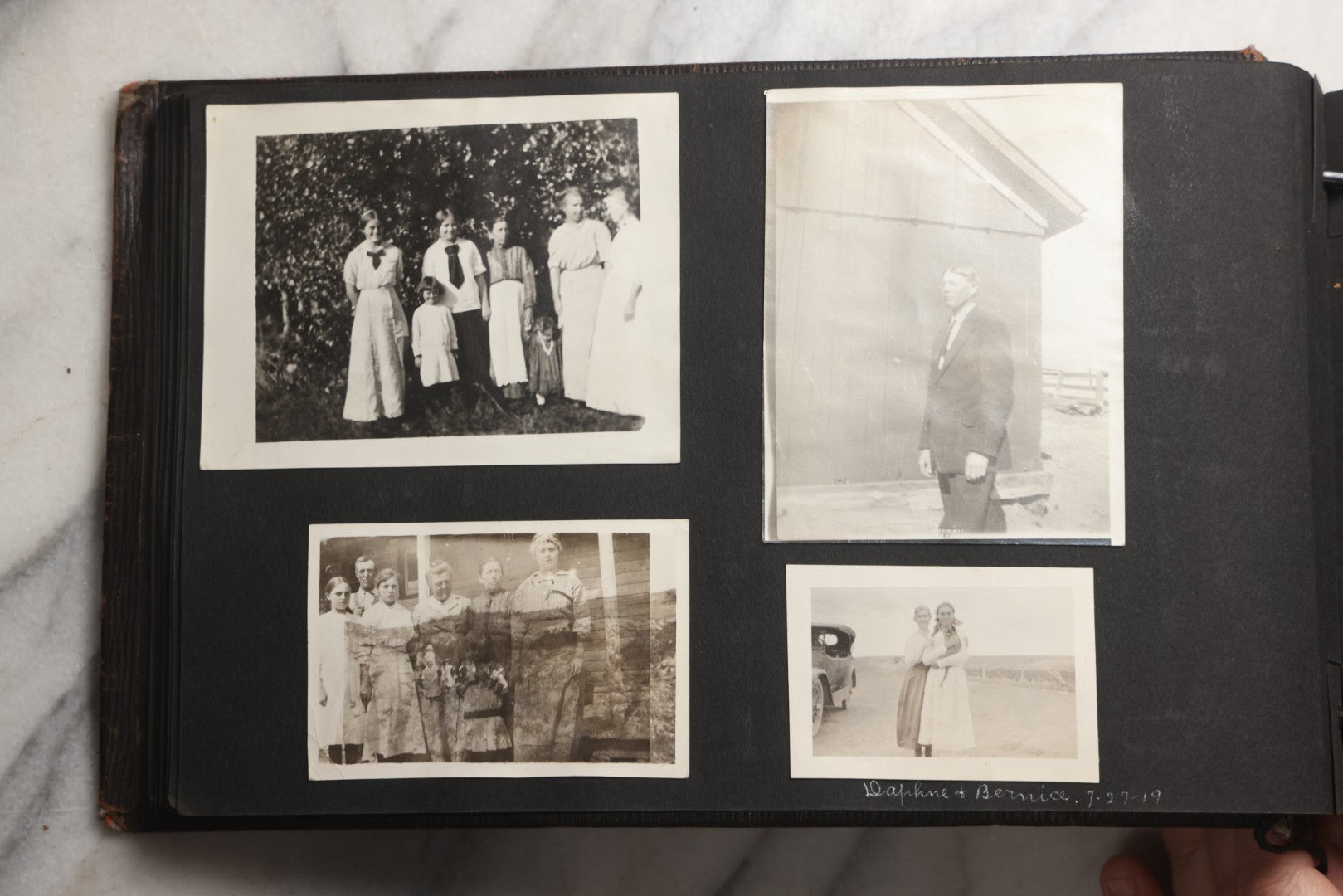 Lot 025 - Antique Snapshot Photo Album Gifted To Zella On Christmas 1916 With 1750+ Photos Of Midwest And Western Scenes Including Telluride & Greeley Colorado, Farm Life, Animals, Automobiles, Oil Wells, Early Aviation, And WWI Soldiers, 1916–1920