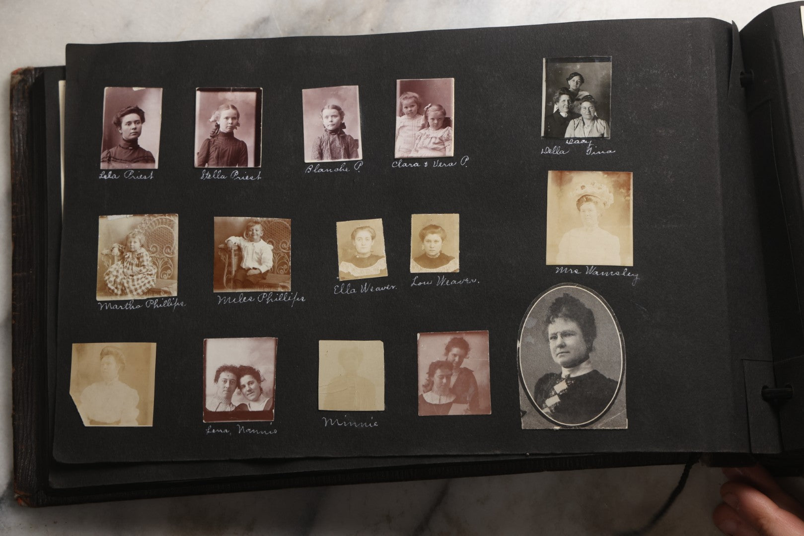 Lot 025 - Antique Snapshot Photo Album Gifted To Zella On Christmas 1916 With 1750+ Photos Of Midwest And Western Scenes Including Telluride & Greeley Colorado, Farm Life, Animals, Automobiles, Oil Wells, Early Aviation, And WWI Soldiers, 1916–1920