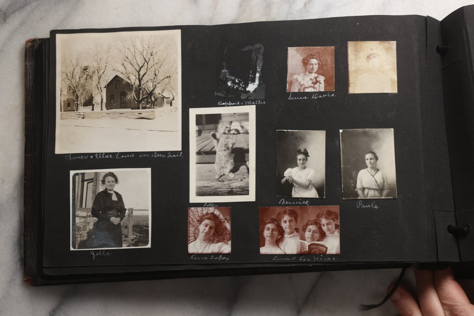 Lot 025 - Antique Snapshot Photo Album Gifted To Zella On Christmas 1916 With 1750+ Photos Of Midwest And Western Scenes Including Telluride & Greeley Colorado, Farm Life, Animals, Automobiles, Oil Wells, Early Aviation, And WWI Soldiers, 1916–1920