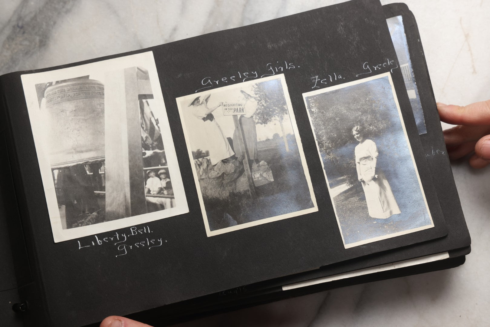 Lot 025 - Antique Snapshot Photo Album Gifted To Zella On Christmas 1916 With 1750+ Photos Of Midwest And Western Scenes Including Telluride & Greeley Colorado, Farm Life, Animals, Automobiles, Oil Wells, Early Aviation, And WWI Soldiers, 1916–1920