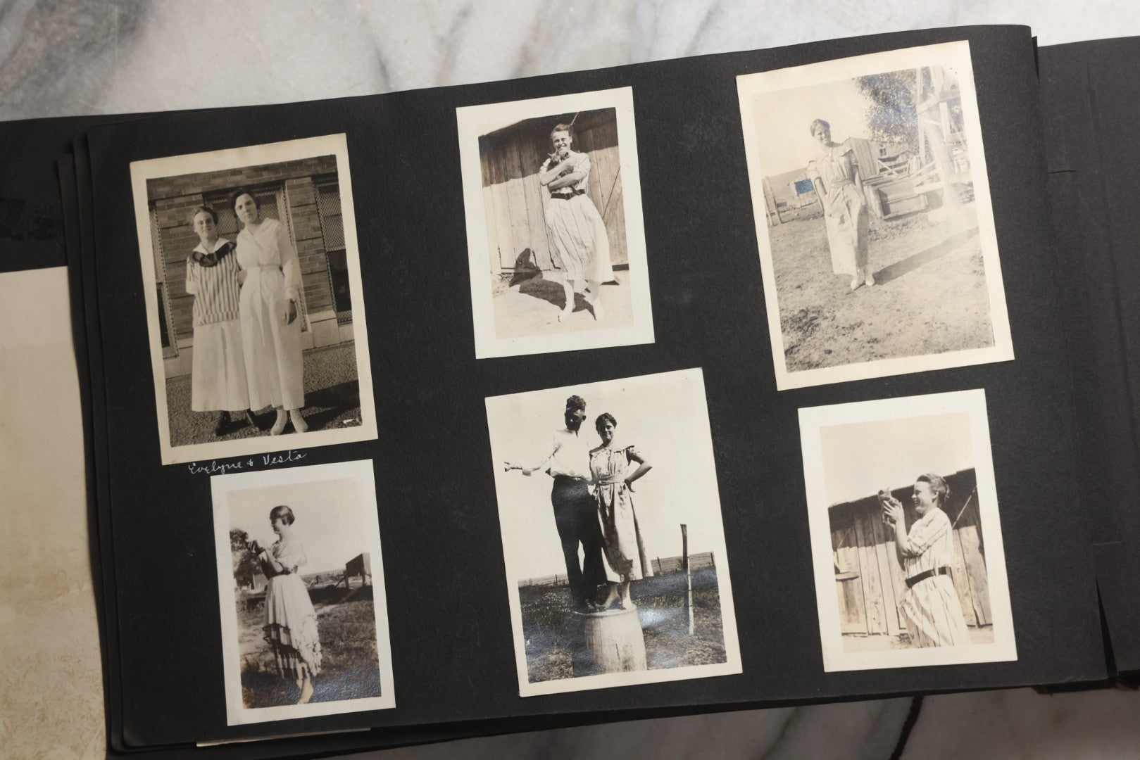 Lot 025 - Antique Snapshot Photo Album Gifted To Zella On Christmas 1916 With 1750+ Photos Of Midwest And Western Scenes Including Telluride & Greeley Colorado, Farm Life, Animals, Automobiles, Oil Wells, Early Aviation, And WWI Soldiers, 1916–1920