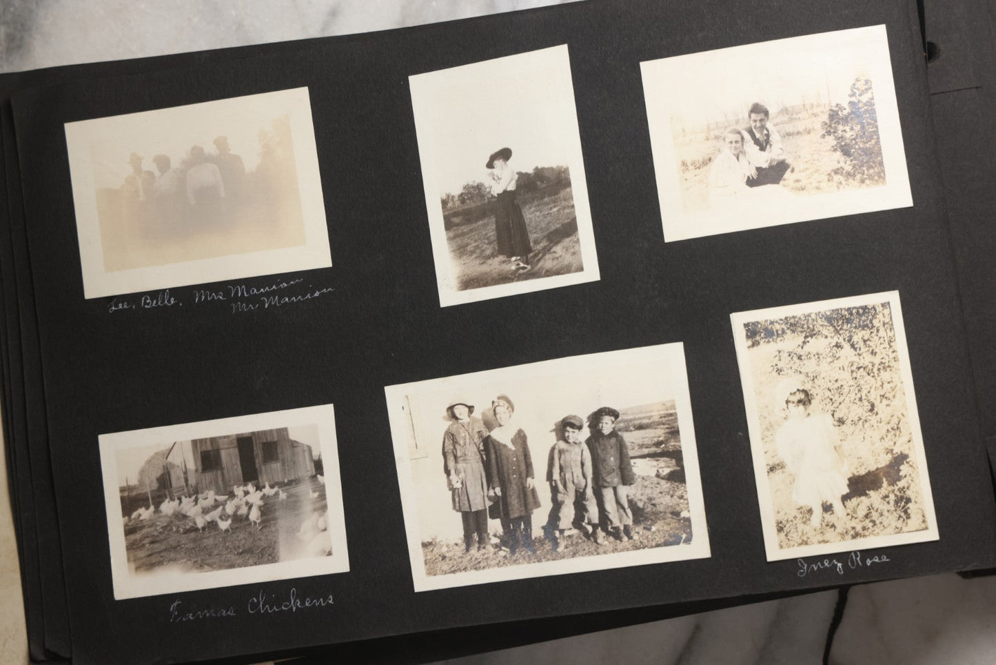 Lot 025 - Antique Snapshot Photo Album Gifted To Zella On Christmas 1916 With 1750+ Photos Of Midwest And Western Scenes Including Telluride & Greeley Colorado, Farm Life, Animals, Automobiles, Oil Wells, Early Aviation, And WWI Soldiers, 1916–1920