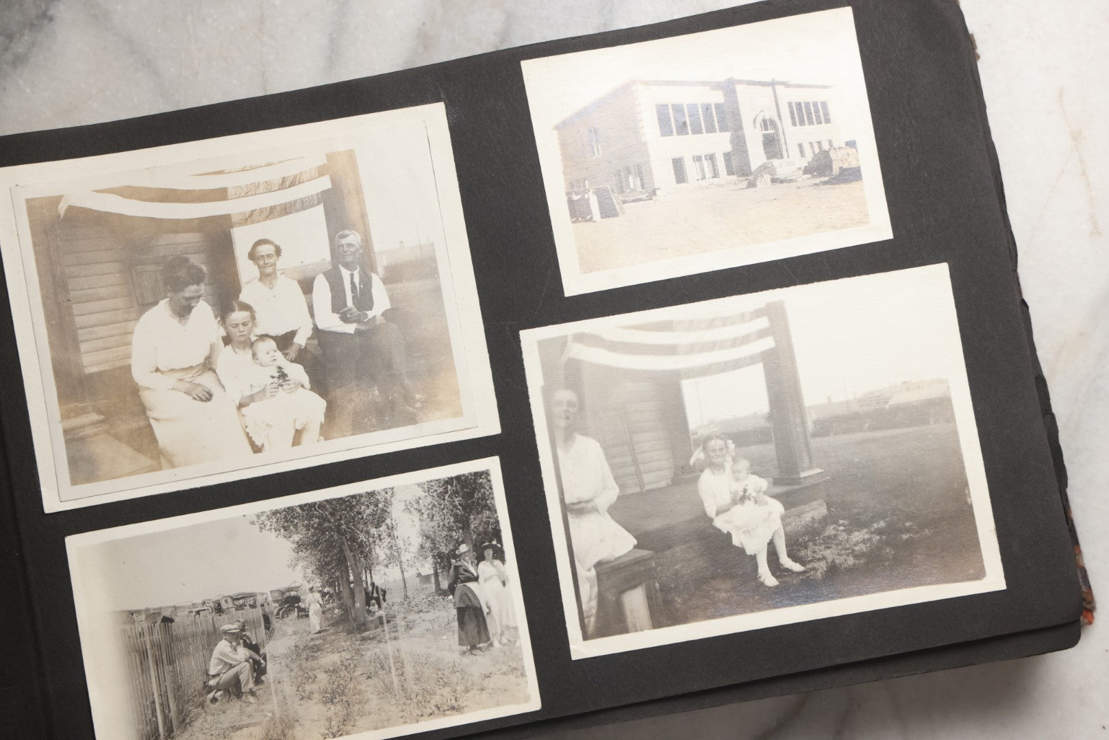 Lot 025 - Antique Snapshot Photo Album Gifted To Zella On Christmas 1916 With 1750+ Photos Of Midwest And Western Scenes Including Telluride & Greeley Colorado, Farm Life, Animals, Automobiles, Oil Wells, Early Aviation, And WWI Soldiers, 1916–1920