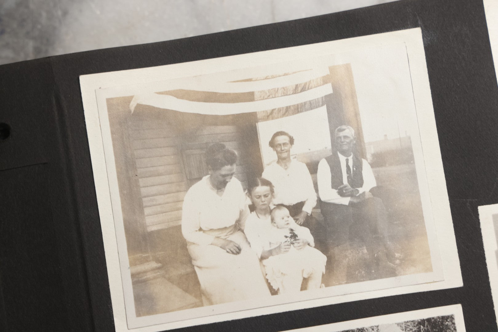 Lot 025 - Antique Snapshot Photo Album Gifted To Zella On Christmas 1916 With 1750+ Photos Of Midwest And Western Scenes Including Telluride & Greeley Colorado, Farm Life, Animals, Automobiles, Oil Wells, Early Aviation, And WWI Soldiers, 1916–1920
