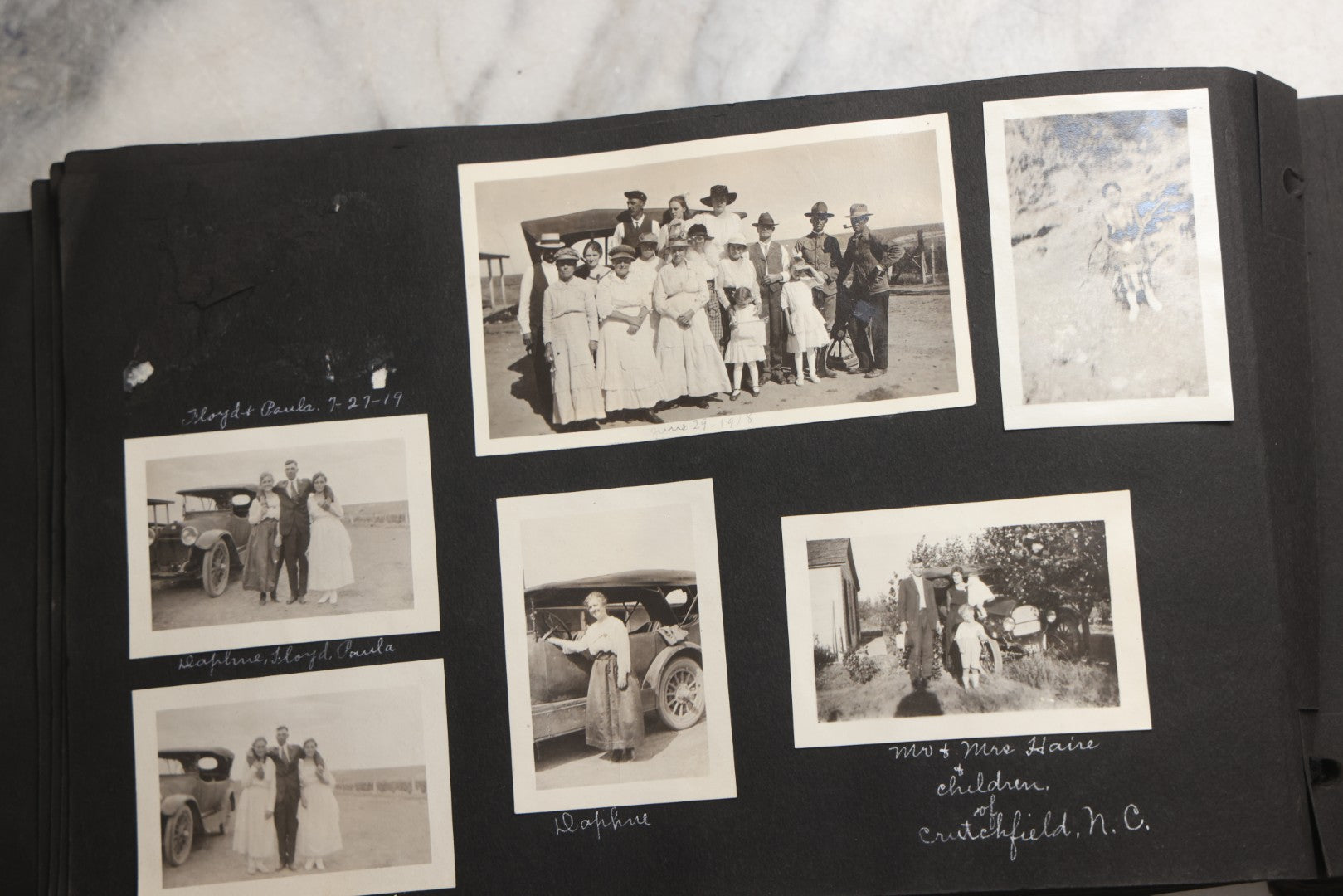 Lot 025 - Antique Snapshot Photo Album Gifted To Zella On Christmas 1916 With 1750+ Photos Of Midwest And Western Scenes Including Telluride & Greeley Colorado, Farm Life, Animals, Automobiles, Oil Wells, Early Aviation, And WWI Soldiers, 1916–1920