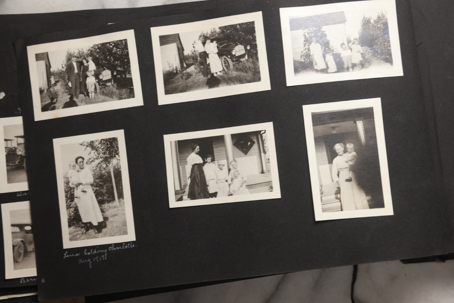 Lot 025 - Antique Snapshot Photo Album Gifted To Zella On Christmas 1916 With 1750+ Photos Of Midwest And Western Scenes Including Telluride & Greeley Colorado, Farm Life, Animals, Automobiles, Oil Wells, Early Aviation, And WWI Soldiers, 1916–1920