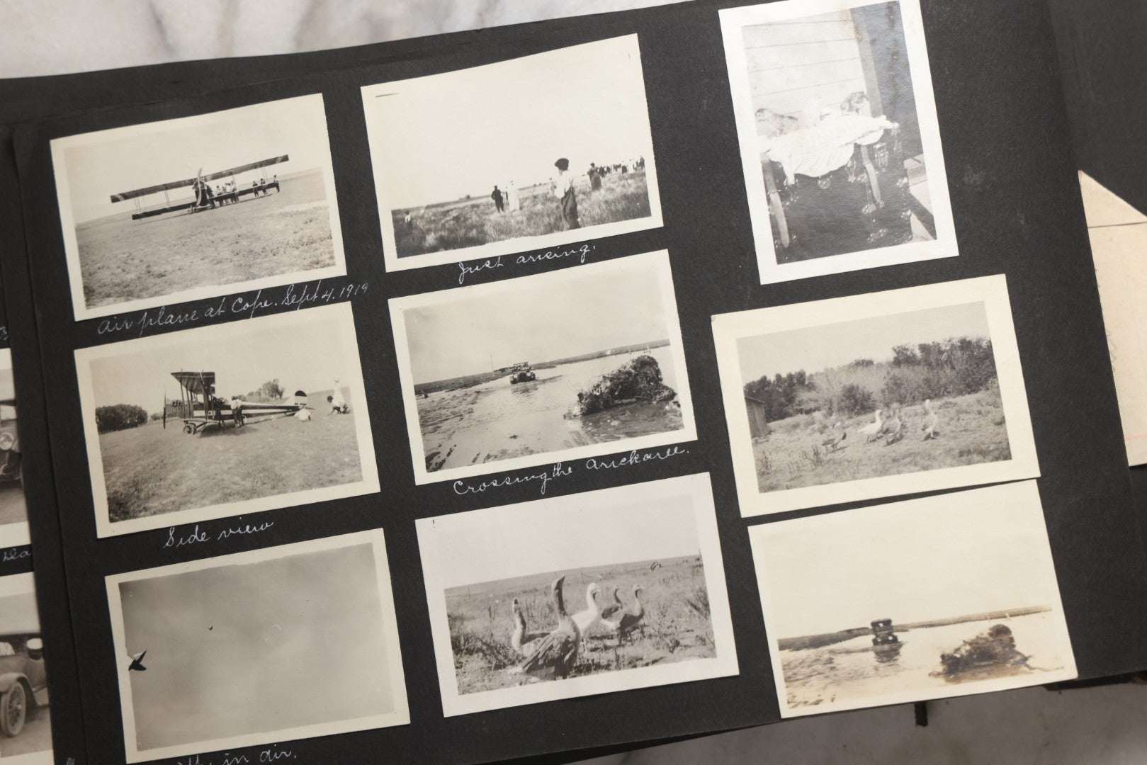 Lot 025 - Antique Snapshot Photo Album Gifted To Zella On Christmas 1916 With 1750+ Photos Of Midwest And Western Scenes Including Telluride & Greeley Colorado, Farm Life, Animals, Automobiles, Oil Wells, Early Aviation, And WWI Soldiers, 1916–1920