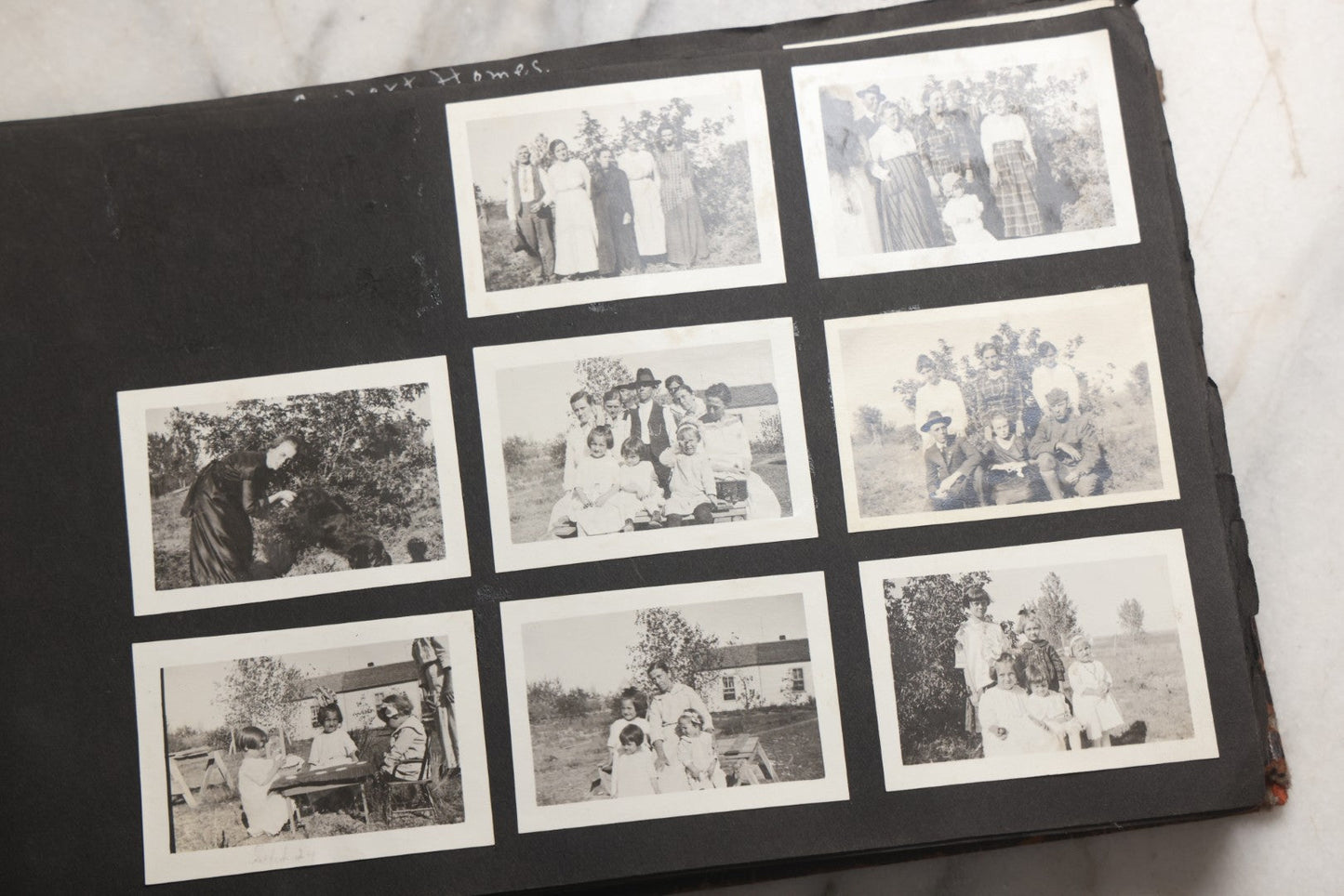 Lot 025 - Antique Snapshot Photo Album Gifted To Zella On Christmas 1916 With 1750+ Photos Of Midwest And Western Scenes Including Telluride & Greeley Colorado, Farm Life, Animals, Automobiles, Oil Wells, Early Aviation, And WWI Soldiers, 1916–1920