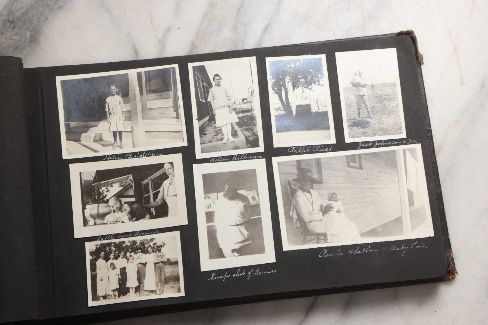 Lot 025 - Antique Snapshot Photo Album Gifted To Zella On Christmas 1916 With 1750+ Photos Of Midwest And Western Scenes Including Telluride & Greeley Colorado, Farm Life, Animals, Automobiles, Oil Wells, Early Aviation, And WWI Soldiers, 1916–1920
