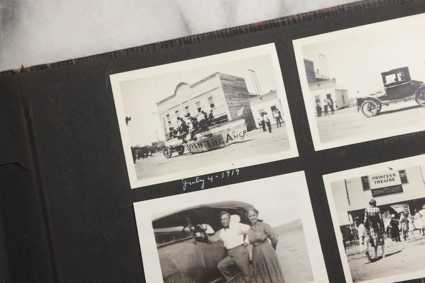 Lot 025 - Antique Snapshot Photo Album Gifted To Zella On Christmas 1916 With 1750+ Photos Of Midwest And Western Scenes Including Telluride & Greeley Colorado, Farm Life, Animals, Automobiles, Oil Wells, Early Aviation, And WWI Soldiers, 1916–1920