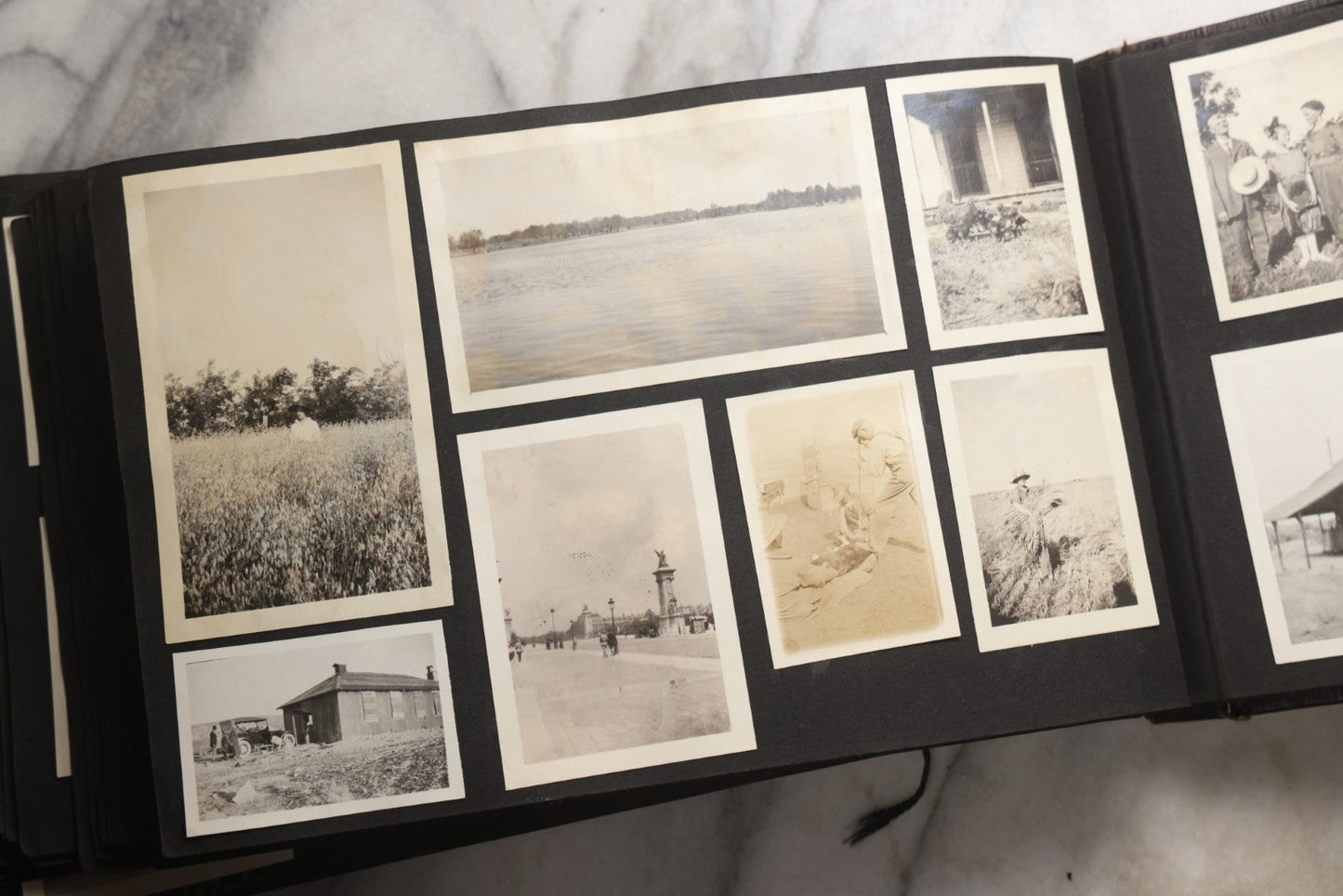Lot 025 - Antique Snapshot Photo Album Gifted To Zella On Christmas 1916 With 1750+ Photos Of Midwest And Western Scenes Including Telluride & Greeley Colorado, Farm Life, Animals, Automobiles, Oil Wells, Early Aviation, And WWI Soldiers, 1916–1920