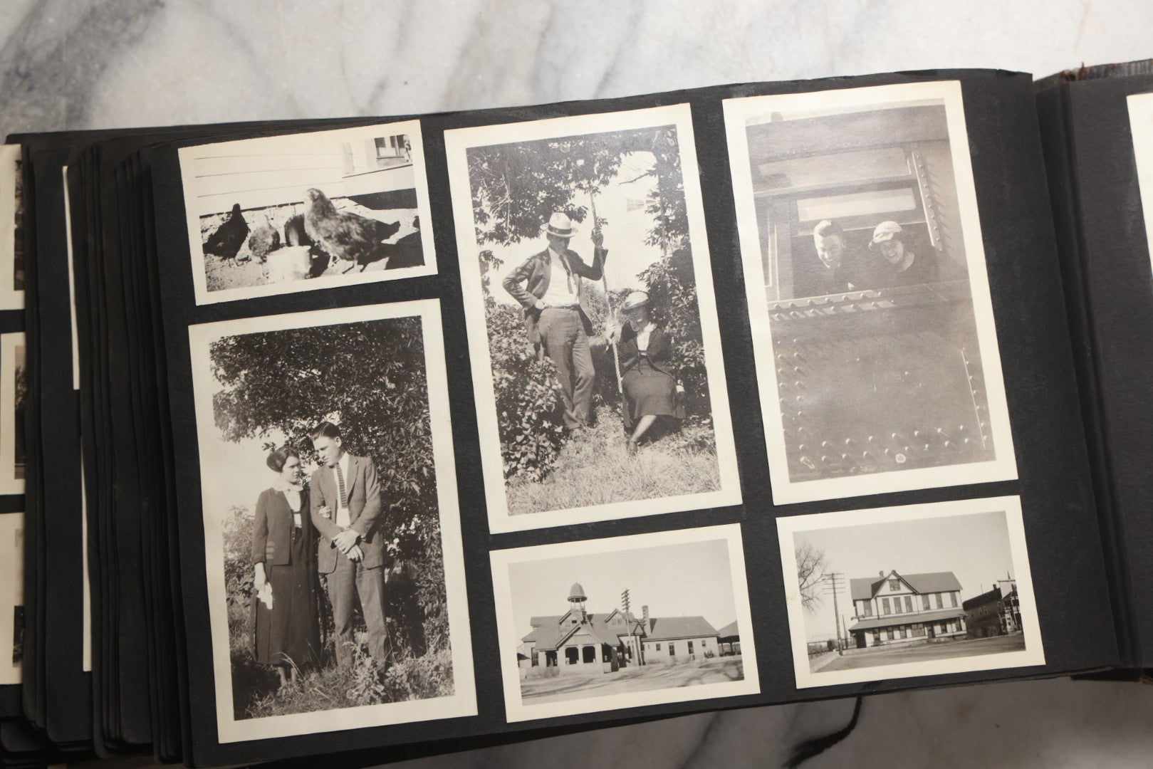 Lot 025 - Antique Snapshot Photo Album Gifted To Zella On Christmas 1916 With 1750+ Photos Of Midwest And Western Scenes Including Telluride & Greeley Colorado, Farm Life, Animals, Automobiles, Oil Wells, Early Aviation, And WWI Soldiers, 1916–1920