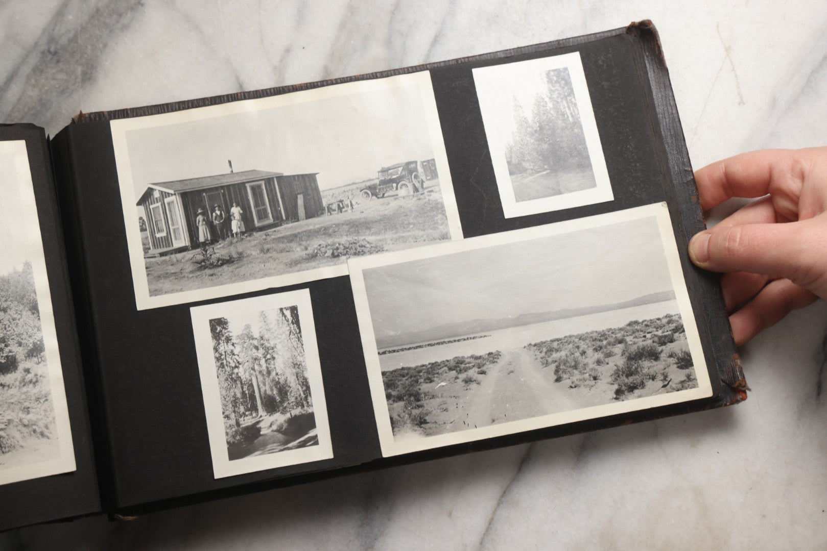 Lot 025 - Antique Snapshot Photo Album Gifted To Zella On Christmas 1916 With 1750+ Photos Of Midwest And Western Scenes Including Telluride & Greeley Colorado, Farm Life, Animals, Automobiles, Oil Wells, Early Aviation, And WWI Soldiers, 1916–1920
