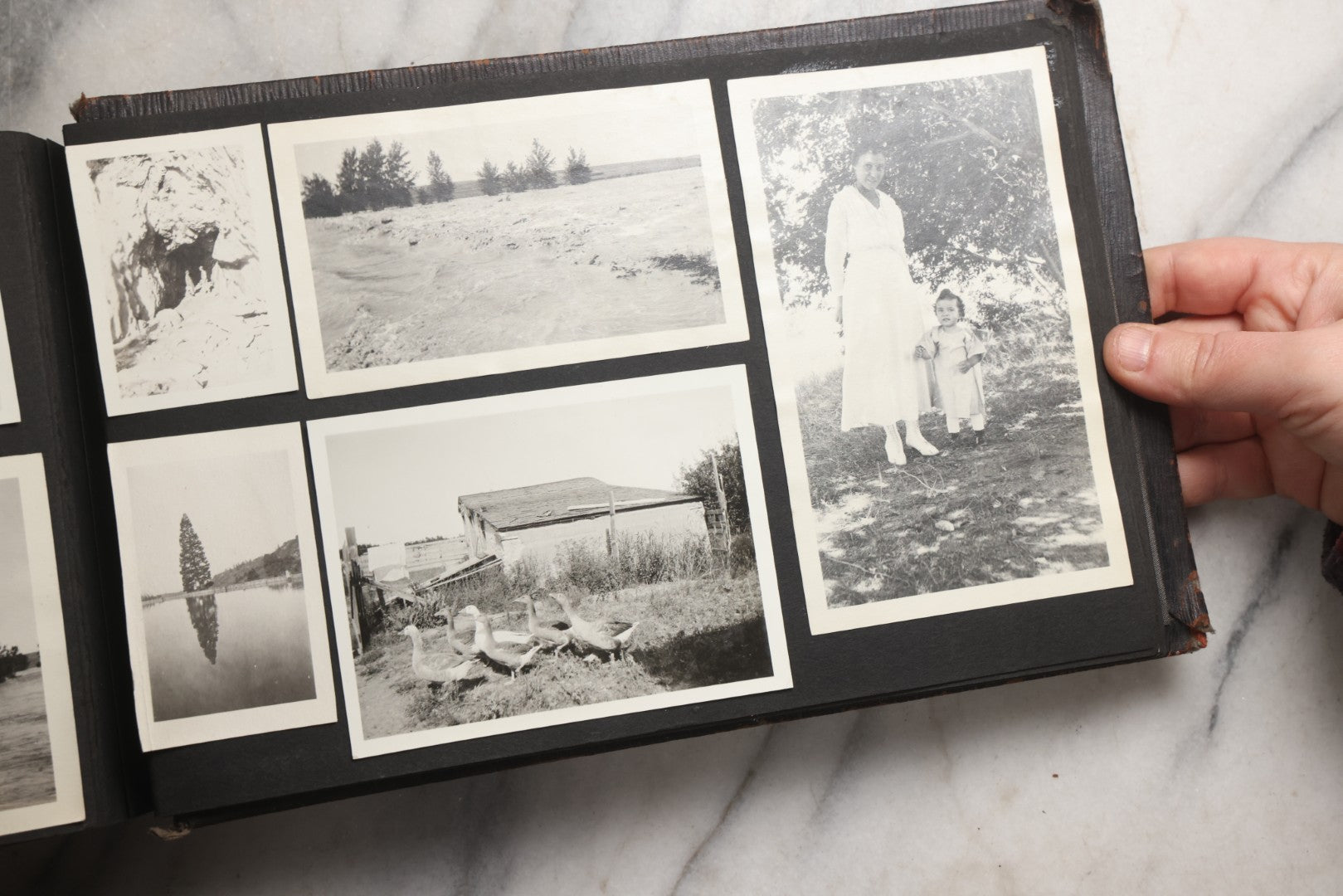 Lot 025 - Antique Snapshot Photo Album Gifted To Zella On Christmas 1916 With 1750+ Photos Of Midwest And Western Scenes Including Telluride & Greeley Colorado, Farm Life, Animals, Automobiles, Oil Wells, Early Aviation, And WWI Soldiers, 1916–1920