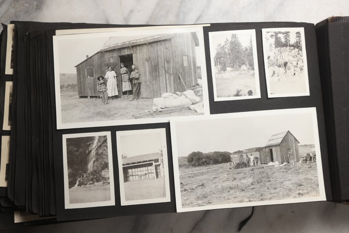 Lot 025 - Antique Snapshot Photo Album Gifted To Zella On Christmas 1916 With 1750+ Photos Of Midwest And Western Scenes Including Telluride & Greeley Colorado, Farm Life, Animals, Automobiles, Oil Wells, Early Aviation, And WWI Soldiers, 1916–1920