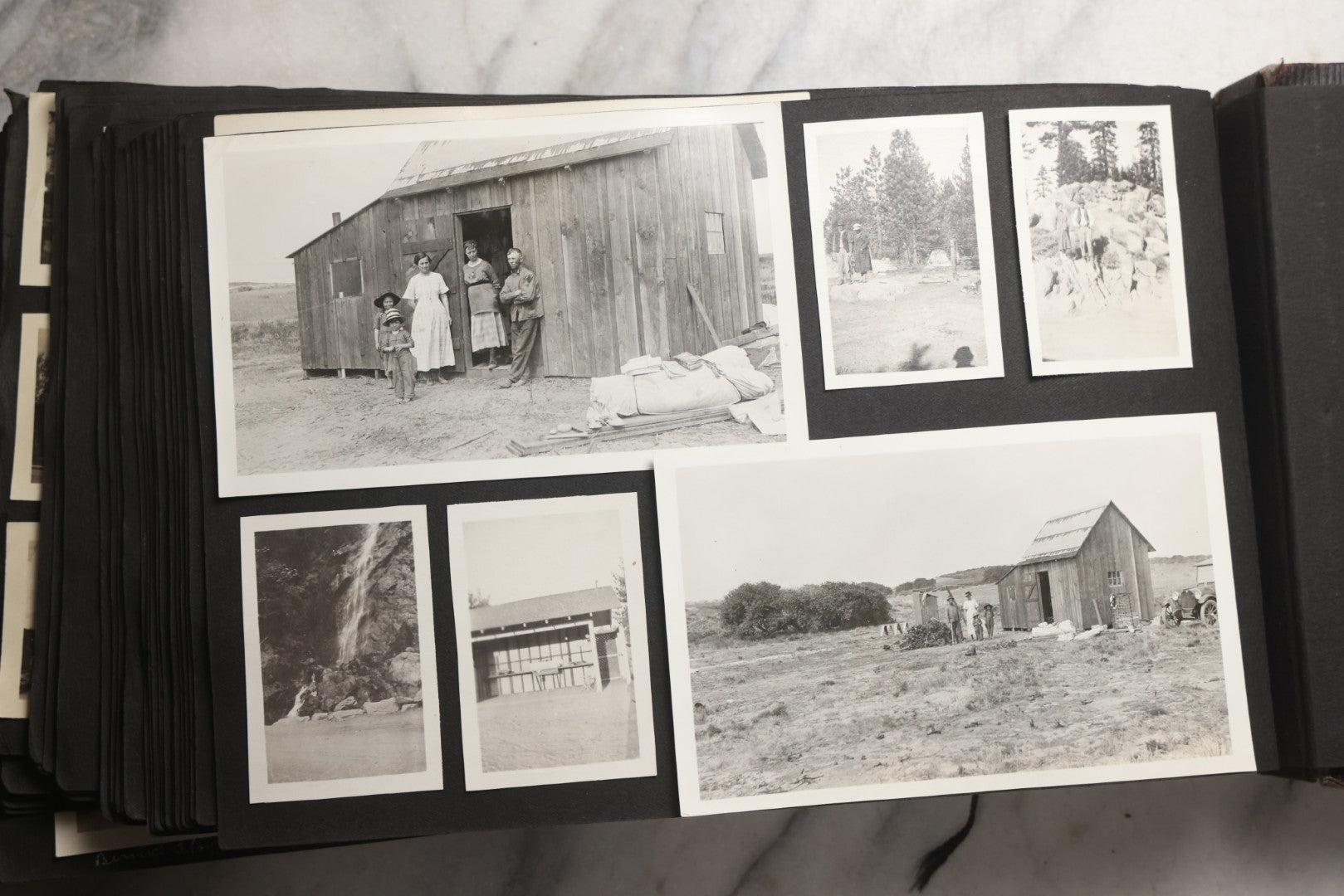 Lot 025 - Antique Snapshot Photo Album Gifted To Zella On Christmas 1916 With 1750+ Photos Of Midwest And Western Scenes Including Telluride & Greeley Colorado, Farm Life, Animals, Automobiles, Oil Wells, Early Aviation, And WWI Soldiers, 1916–1920