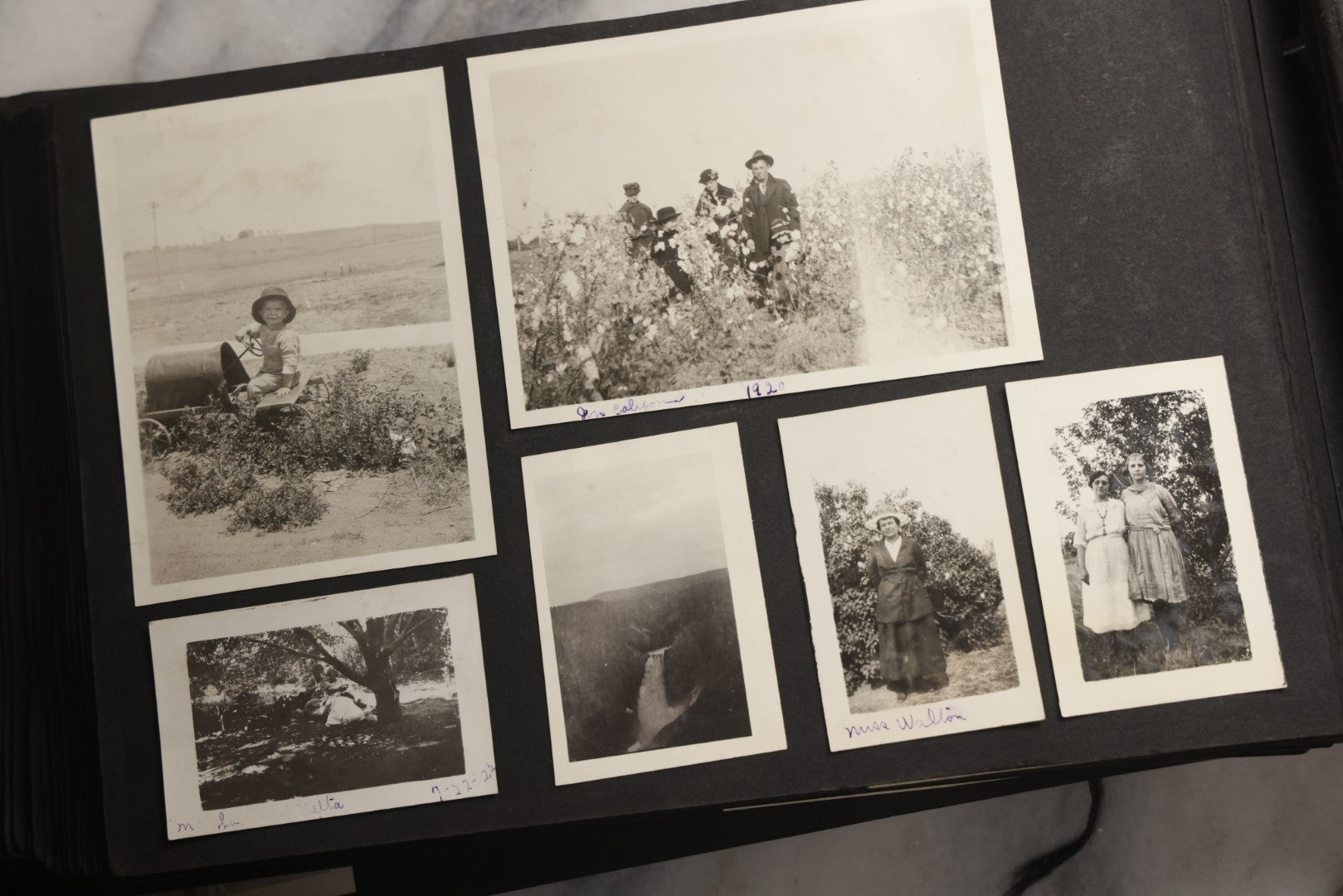 Lot 025 - Antique Snapshot Photo Album Gifted To Zella On Christmas 1916 With 1750+ Photos Of Midwest And Western Scenes Including Telluride & Greeley Colorado, Farm Life, Animals, Automobiles, Oil Wells, Early Aviation, And WWI Soldiers, 1916–1920