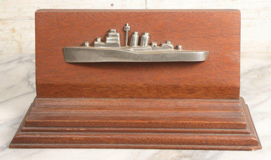 Lot 028 - Vintage U.S. Navy Cruiser Desk Stand Pen Rest With Cast Metal Ship Plaque, Likely Depicting A Baltimore- Or Cleveland-Class WWII Cruiser, Mahogany Base, 11" L