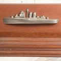 Lot 028 - Vintage U.S. Navy Cruiser Desk Stand Pen Rest With Cast Metal Ship Plaque, Likely Depicting A Baltimore- Or Cleveland-Class WWII Cruiser, Mahogany Base, 11" L