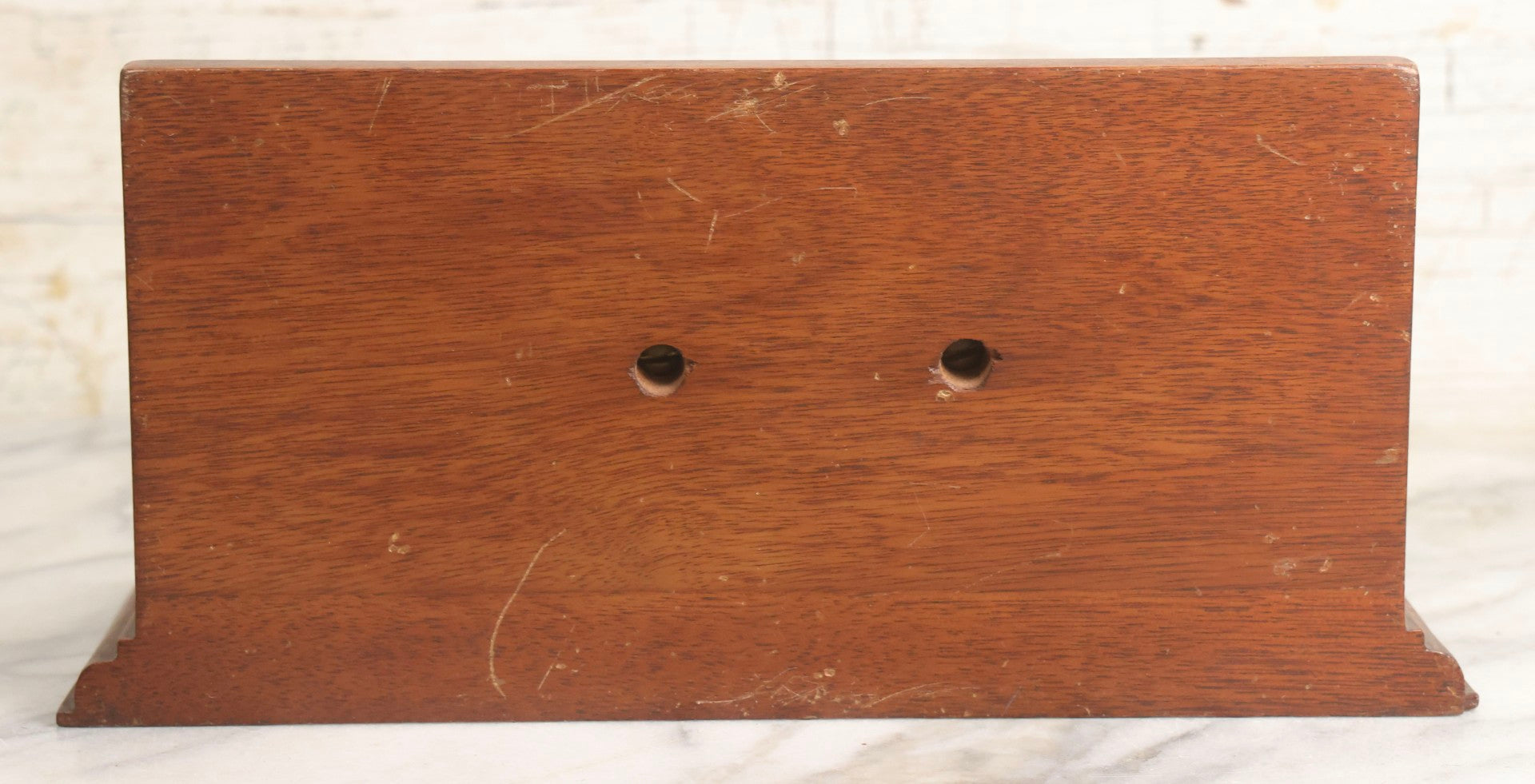 Lot 028 - Vintage U.S. Navy Cruiser Desk Stand Pen Rest With Cast Metal Ship Plaque, Likely Depicting A Baltimore- Or Cleveland-Class WWII Cruiser, Mahogany Base, 11" L