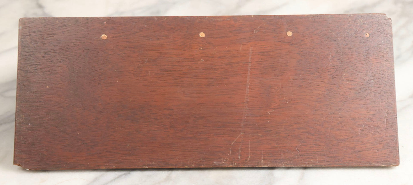 Lot 028 - Vintage U.S. Navy Cruiser Desk Stand Pen Rest With Cast Metal Ship Plaque, Likely Depicting A Baltimore- Or Cleveland-Class WWII Cruiser, Mahogany Base, 11" L