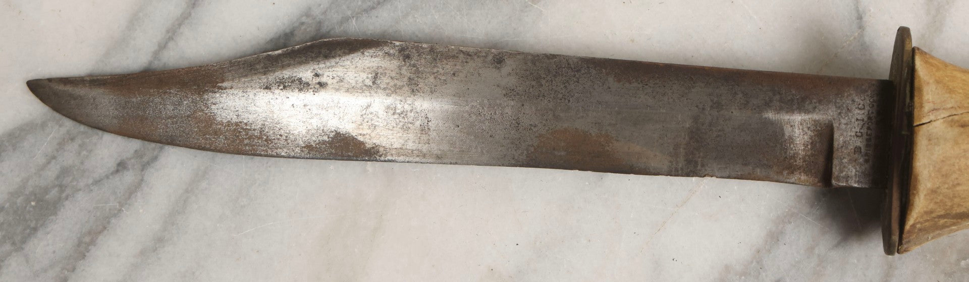 Lot 030 - Antique No. 521 8–12" Bowie Hunting Knife With Stag Antler Handle Carved “Mar Karian,” By Bridgeport Gun And Implement Company (B.G.I. Co.), Bridgeport, Connecticut, With Custom Leather Sheath