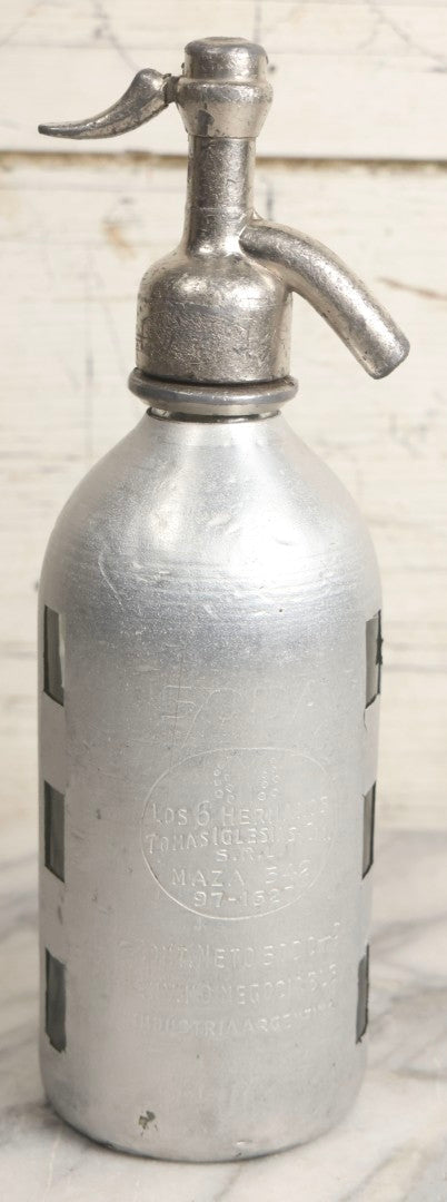 Lot 035 - Vintage Glass Soda Bottle With Aluminum Wrap For Los 6 Hermanos Soda, Tomas Iglesias, With Juan Rutar Spout