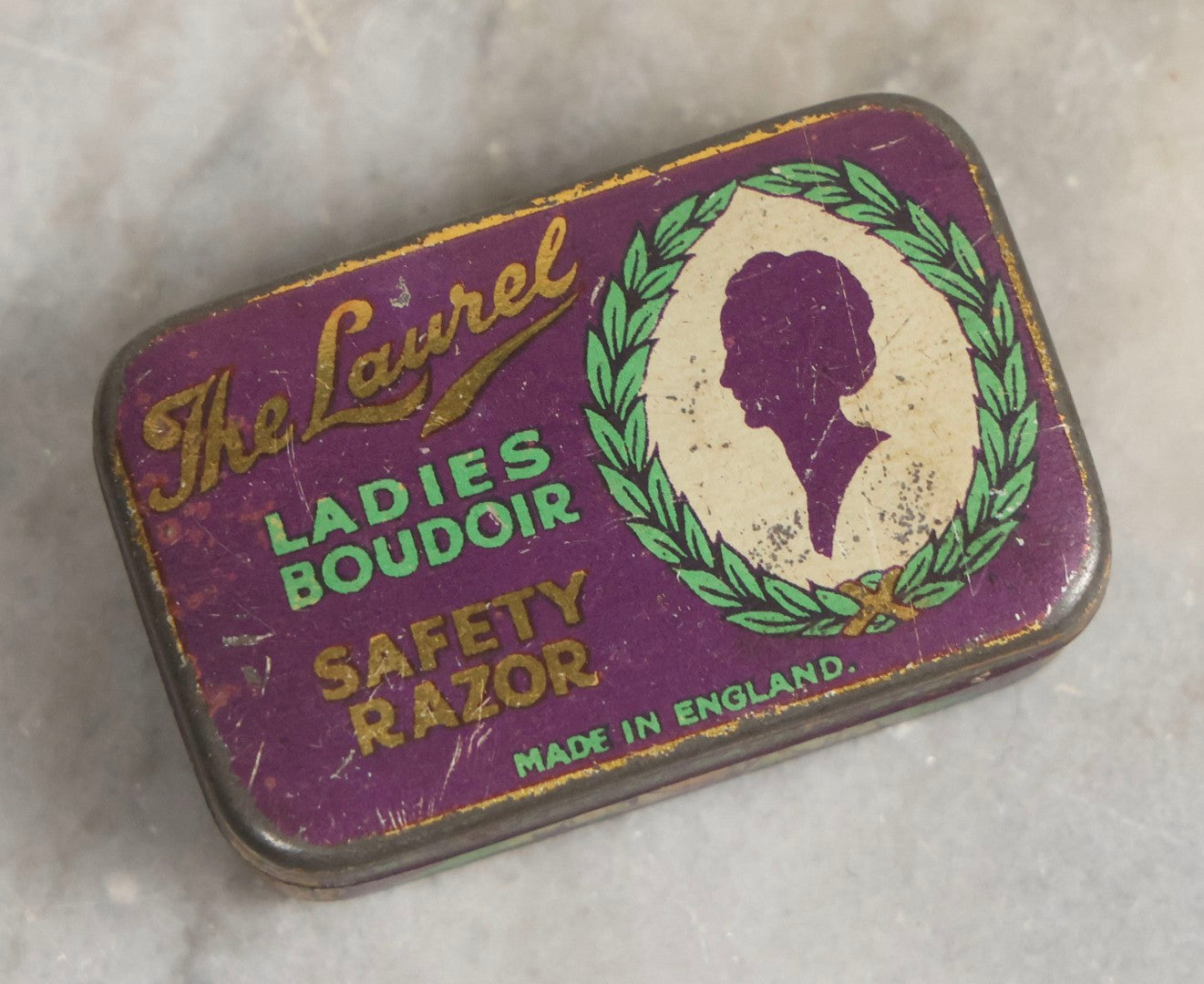 Lot 036 - Trio Of Advertising Tins Including Gescowide Vision Goggles, Laurel Ladies' Boudoir Safety Razor With Contents, And Planters Cocktail Peanuts