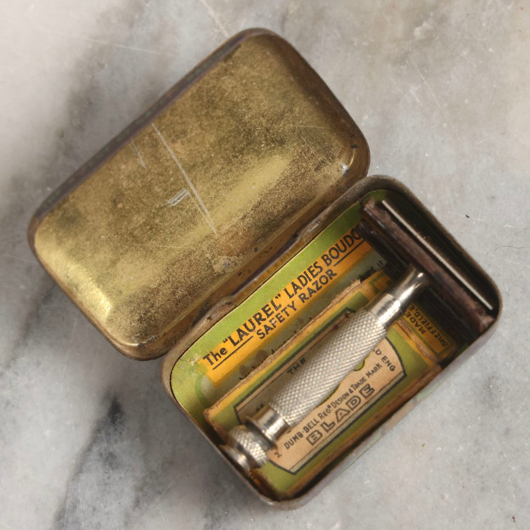 Lot 036 - Trio Of Advertising Tins Including Gescowide Vision Goggles, Laurel Ladies' Boudoir Safety Razor With Contents, And Planters Cocktail Peanuts