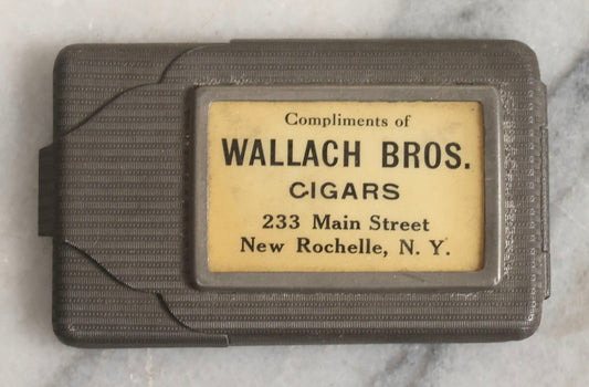 Lot 037 - Antique Pressed Tin Advertising Match Safe, “Compliments Of Wallach Bros. Cigars," 233 Main Street, New Rochelle, New York, Made In Germany