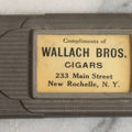 Lot 037 - Antique Pressed Tin Advertising Match Safe, “Compliments Of Wallach Bros. Cigars," 233 Main Street, New Rochelle, New York, Made In Germany