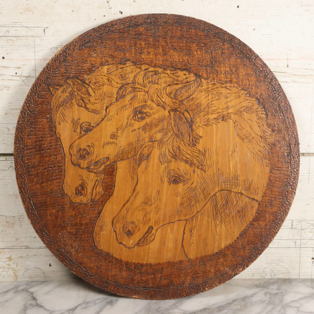 Lot 040 - Antique Pyrography Wood Plaque Depicting Pharaoh's Horses, 18" Diameter