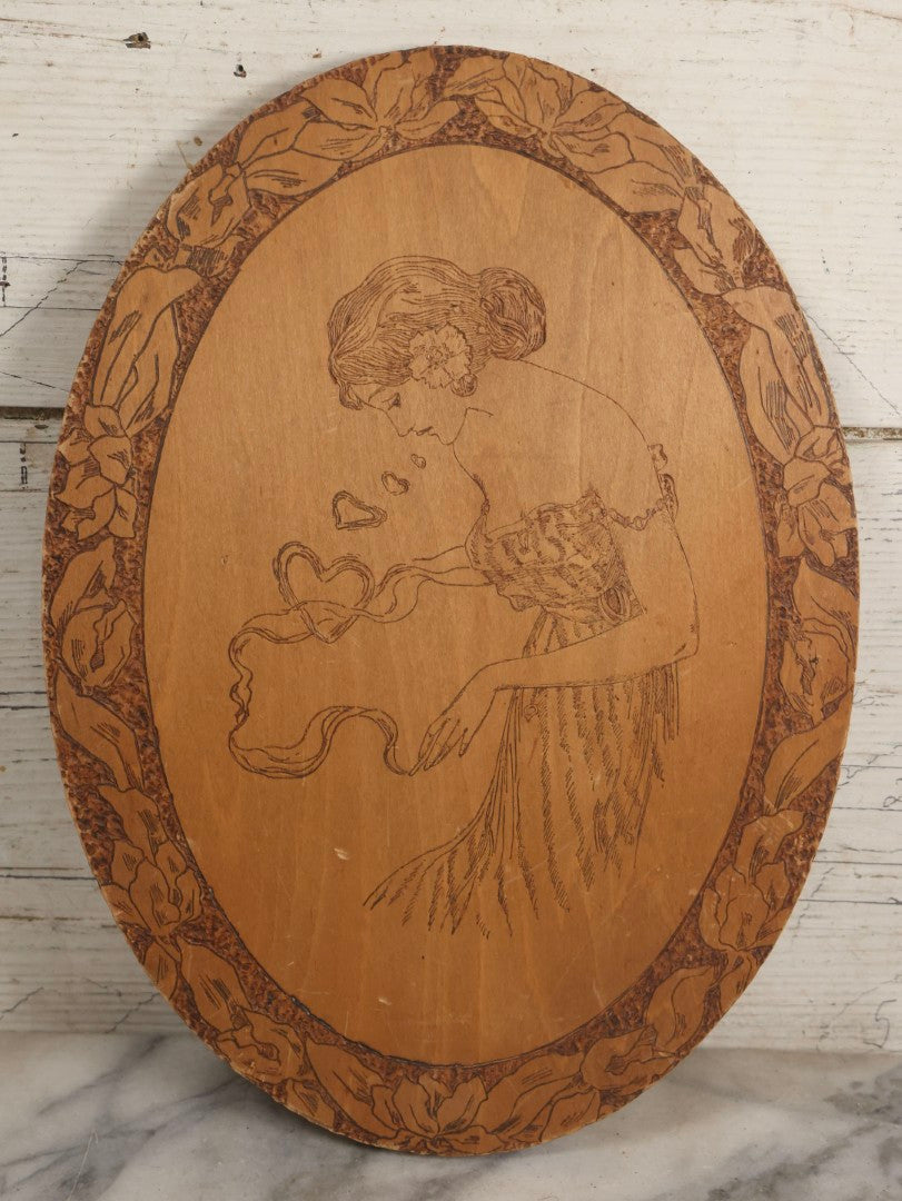 Lot 042 - Antique Pyrography Wood Plaque Depicting Gibson Girl Smoking Cigarette, Heart Shaped Smoke Rings, With Floral Border Design, T&C Chicago, 9-7/8" x 13-1/2"