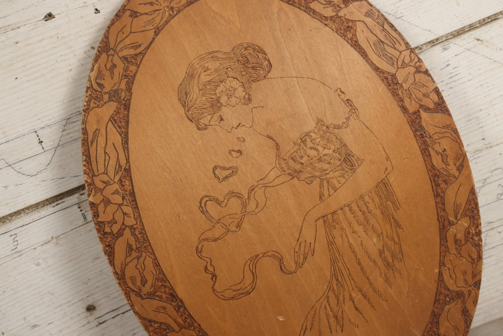Lot 042 - Antique Pyrography Wood Plaque Depicting Gibson Girl Smoking Cigarette, Heart Shaped Smoke Rings, With Floral Border Design, T&C Chicago, 9-7/8" x 13-1/2"