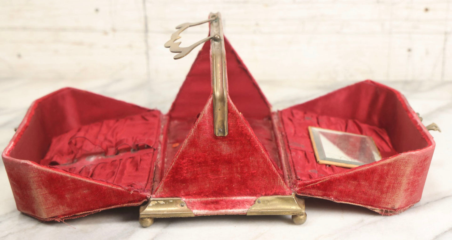 Lot 044 - Antique Rigid Red Velvet Ladies' Purse With Fold-Down Sides, Interior Mirror, Tufted Cushion, And Upholstered Interior