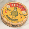 Lot 046 - Vintage Round Paperboard Advertising Box For Tiger Brand Process-Gruyere Cheese, Product Of Switzerland, Manufactured By Roethlisberger & Fils., Langnau (Switzerland), With Dozens Of Tiger Brand Advertising Discs, 4-3/8" Diameter