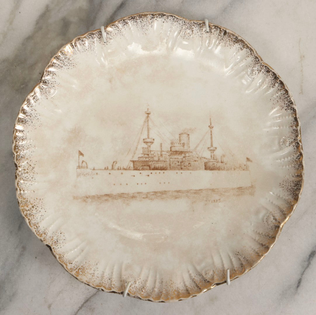 Lot 050 - Antique Transferware Commemorative Plate Of Uss Texas Marked “Semi Porcelain” With Dragon-In-Crown Hallmark And Modern Plate Hanger
