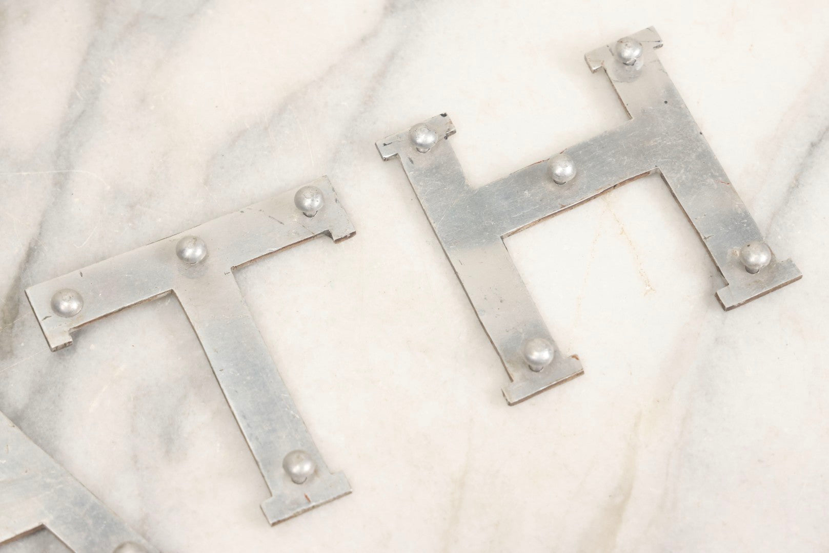 Lot 059 - Vintage Die-Cut Aluminum Sheet Metal Letters Spelling “D-E-A-T-H” With Original Rivets