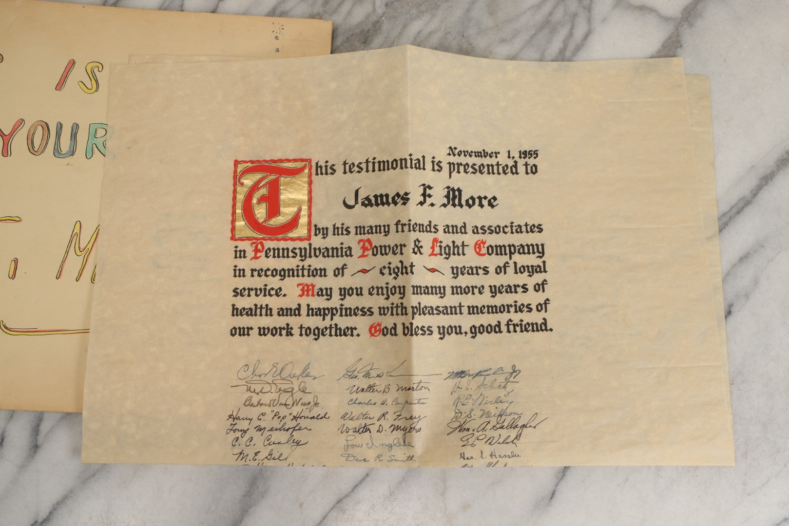 Lot 072 - Vintage Hand-Drawn Illustrated Retirement Book “This Is Your Life Jim More” With Posters, Documents, Party Ephemera, And Photographs, Pennsylvania Power And Light Company, 1955