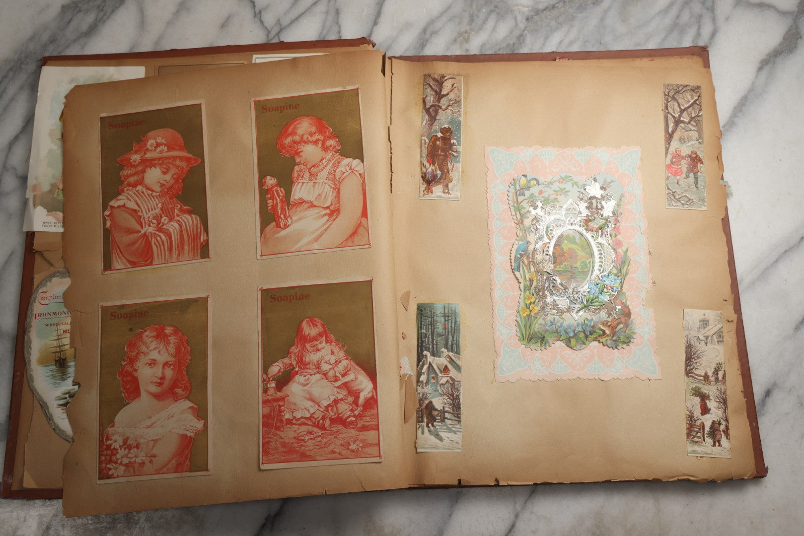 Lot 078 - Antique Scrapbook Album With Gold Embossed Deer In Forest And Pasted Gypsy Woman Chromolithograph On Cover, 150+ Victorian Trade Cards, Die Cuts, Children, Pets And Women's Fashion, Circa 1898