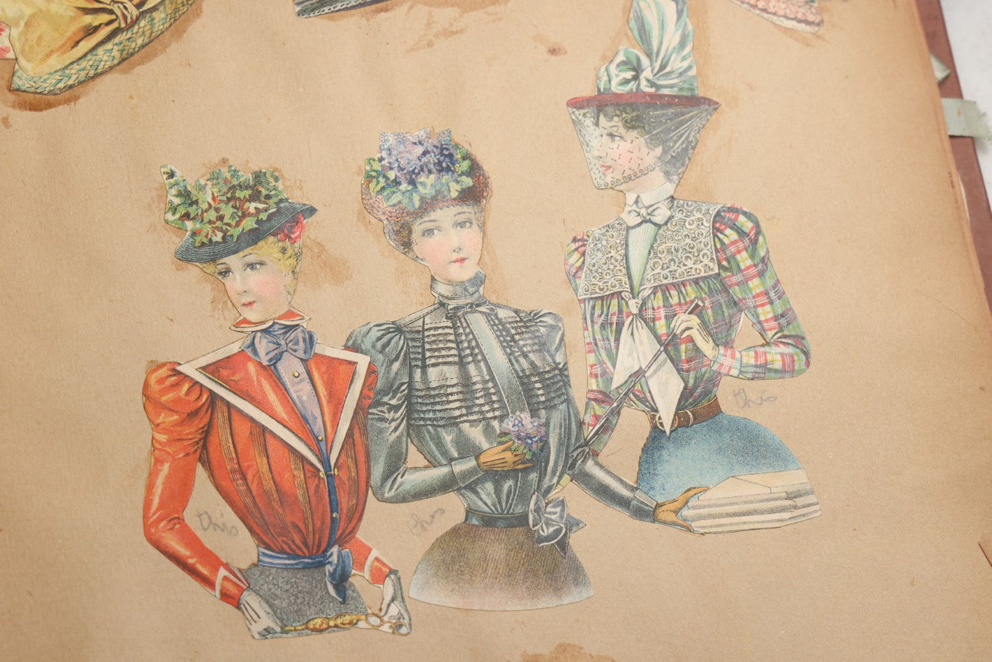 Lot 078 - Antique Scrapbook Album With Gold Embossed Deer In Forest And Pasted Gypsy Woman Chromolithograph On Cover, 150+ Victorian Trade Cards, Die Cuts, Children, Pets And Women's Fashion, Circa 1898