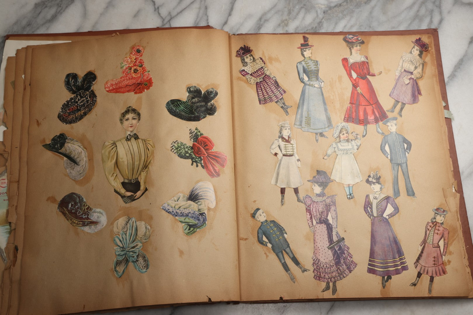 Lot 078 - Antique Scrapbook Album With Gold Embossed Deer In Forest And Pasted Gypsy Woman Chromolithograph On Cover, 150+ Victorian Trade Cards, Die Cuts, Children, Pets And Women's Fashion, Circa 1898