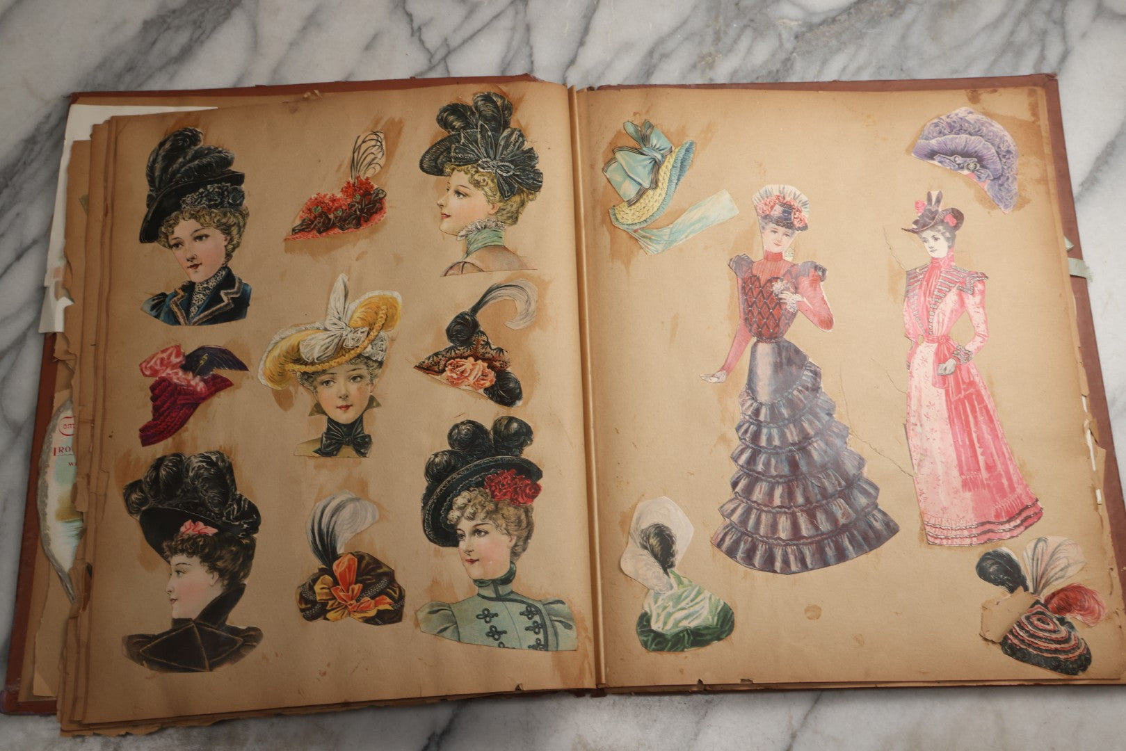 Lot 078 - Antique Scrapbook Album With Gold Embossed Deer In Forest And Pasted Gypsy Woman Chromolithograph On Cover, 150+ Victorian Trade Cards, Die Cuts, Children, Pets And Women's Fashion, Circa 1898